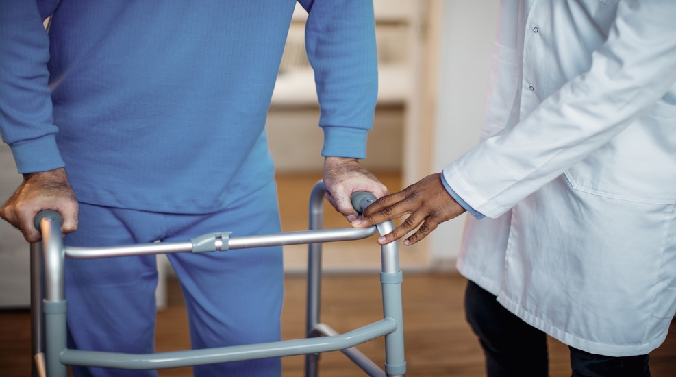 Elderly person receiving physiotherapy treatment