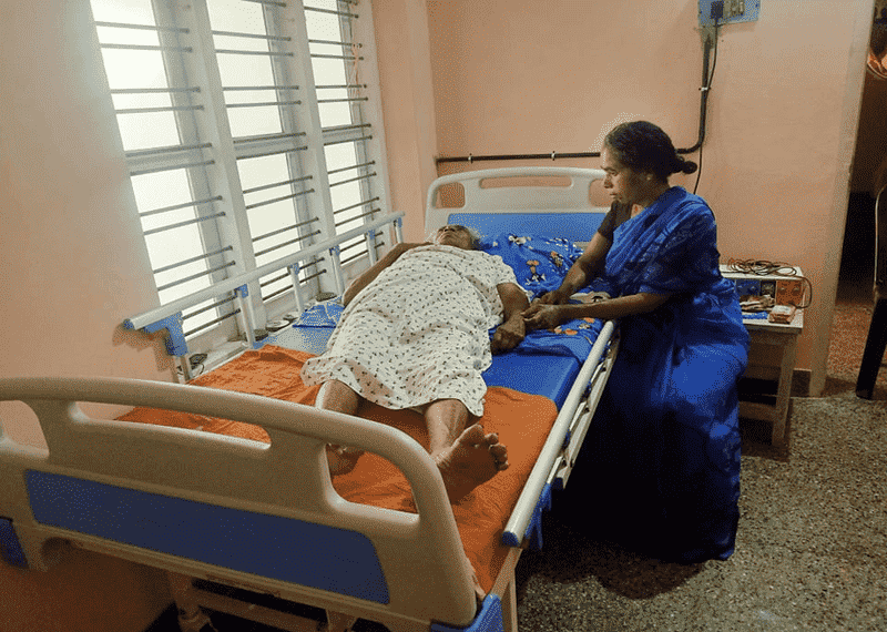 Physiotherapist assisting patient at Newlife Rehabilitation Centre